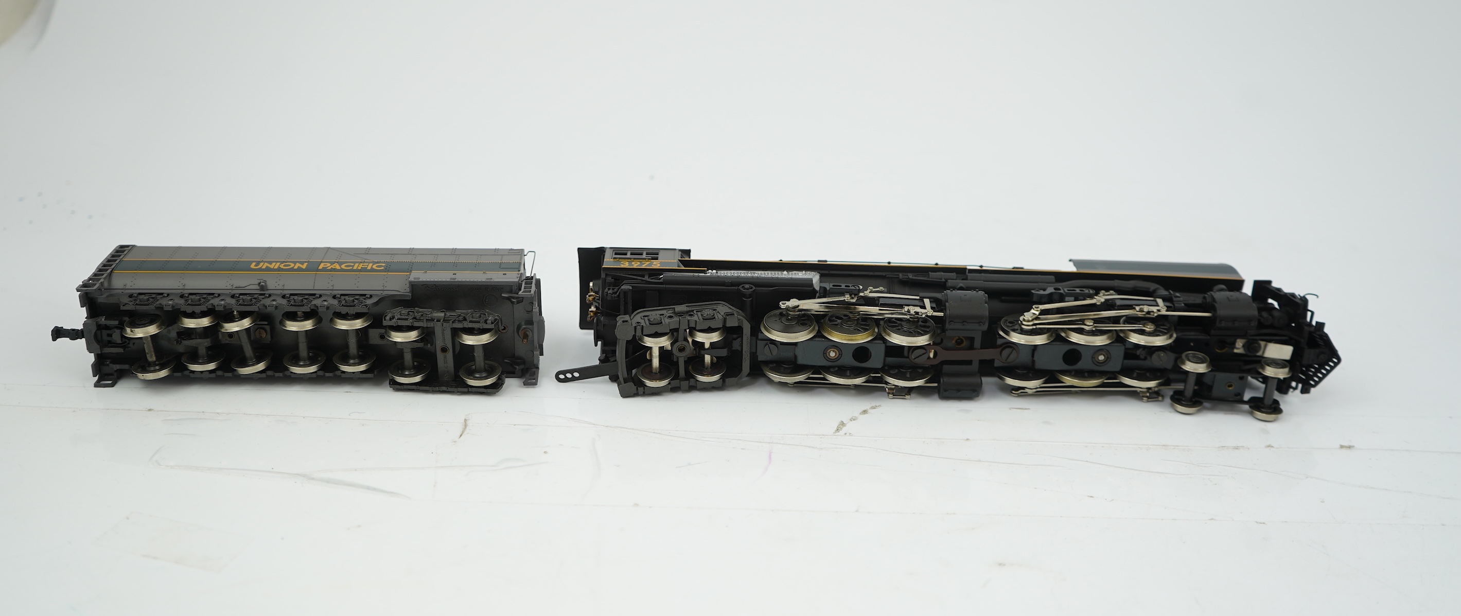 Two HO gauge Rovarossi Union Pacific locomotives; 3975, 4-6-6-4 tender locomotive, together with 836, 4-8-4 tender locomotive, both powered for two rail operation.
